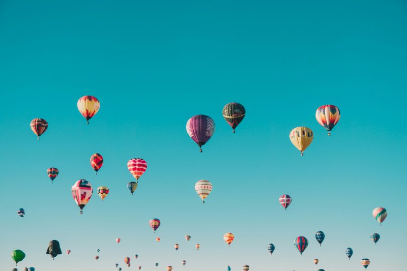 Colorful hot air balloons flying in blue skye