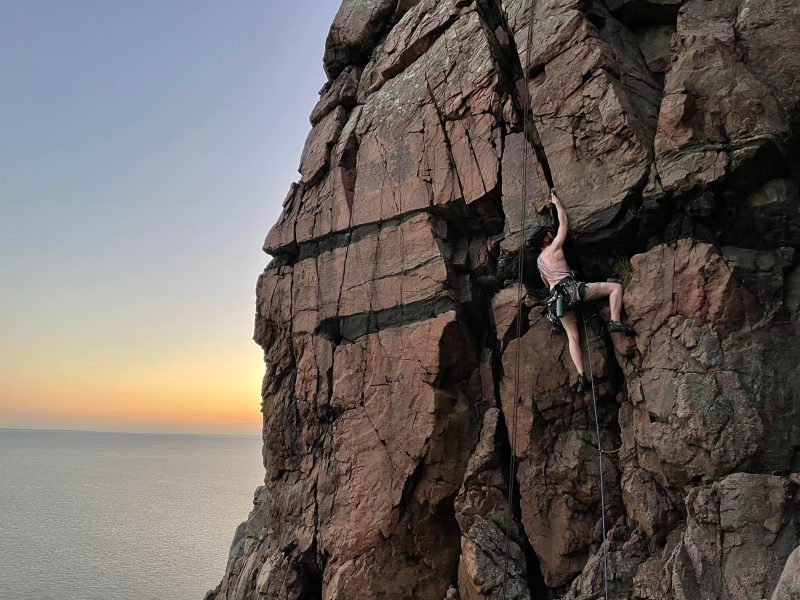 Man climbing a rock